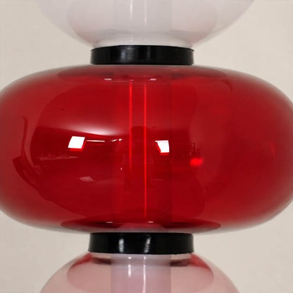 Gemma stacked glass floor lamp stacked glass orbs sculptural silhouette metal frame detail close up structure