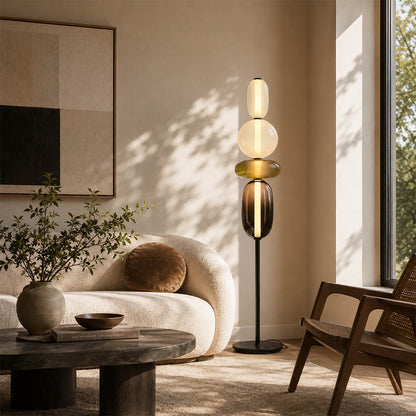 Gemma stacked glass floor lamp Model A red modern living room beside sofa hand-blown art glass sculptural warm glow American home lifestyle interior