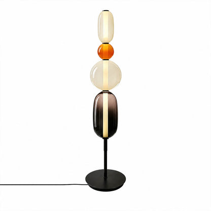 Gemma stacked glass floor lamp Model B black hand-blown art glass stacked orbs integrated LED 63 inch tall modern statement white background front view