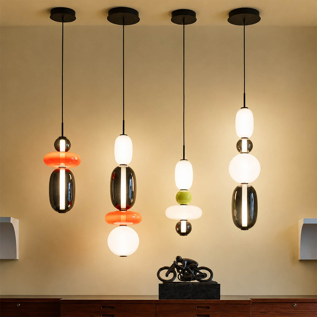 Gemma stacked glass pendant light red cluster over kitchen island hand-blown colored art glass warm glow statement American home lifestyle interior