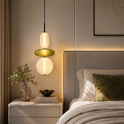 Gemma stacked glass pendant light green smoked single bedside nightstand bedroom hanging hand-blown art glass warm glow American home lifestyle interior