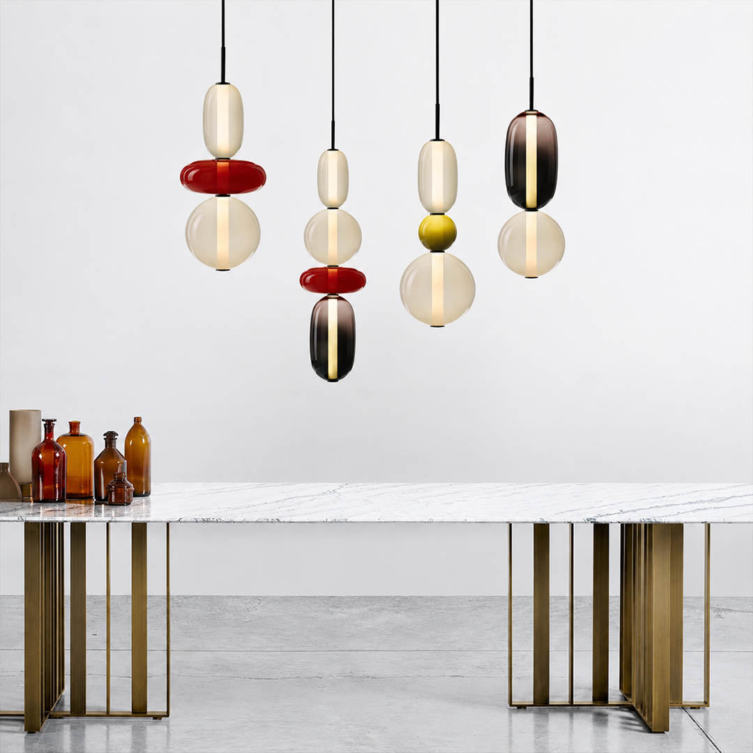 Gemma stacked glass pendant light red cluster over kitchen island hand-blown colored art glass warm glow statement American home lifestyle interior