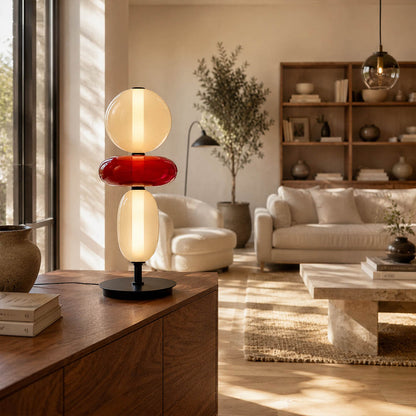 Gemma stacked glass table lamp Model A smoked bookshelf display shelf styled books pottery hand-blown art glass decorative American home lifestyle interior