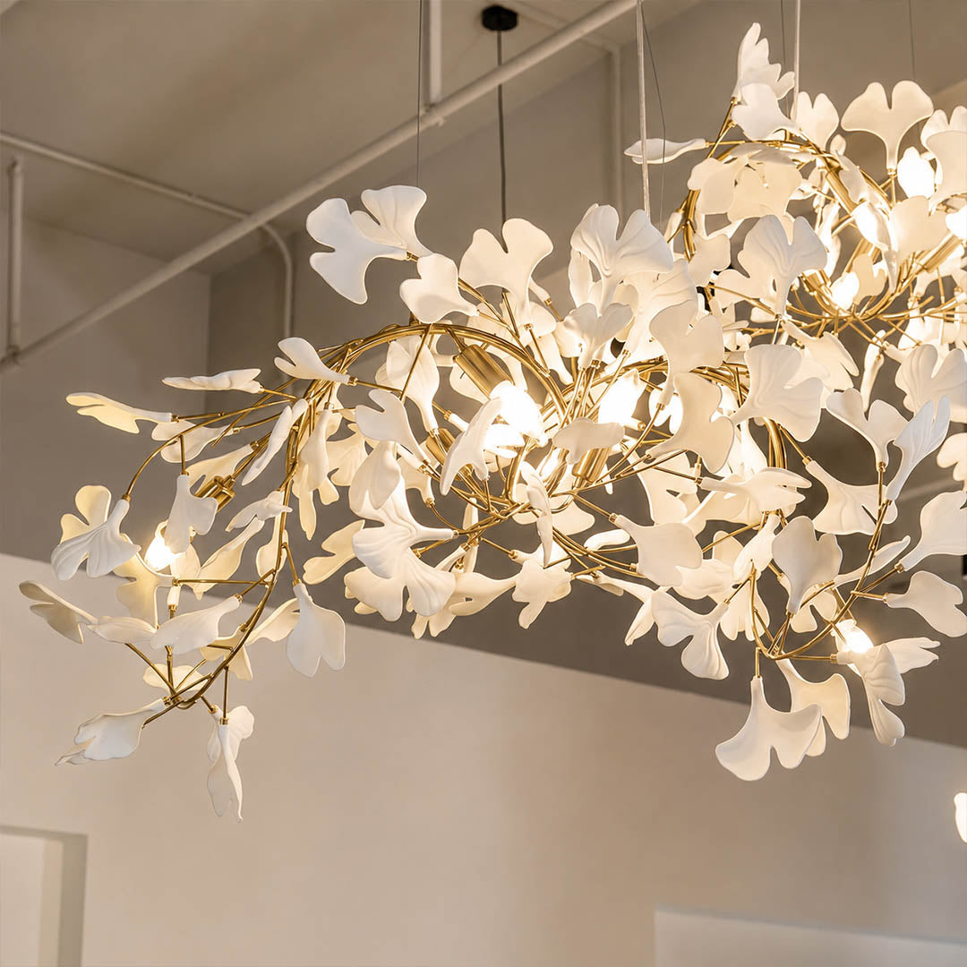 Gingko Chandelier Style I Rose Gold metal frame polished sophisticated warm pink gold finish detail close up architectural