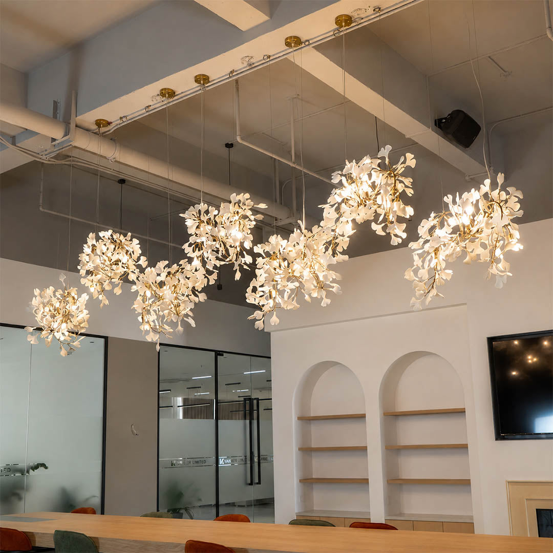 Gingko Chandelier Style I linear vertical 137 inch grand double height foyer staircase entryway statement mid century modern architectural sculptural botanical warm ambient lifestyle interior