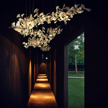 Gingko Chandelier Style J linear 59 inch modern foyer entryway long console mid century architectural botanical warm ambient lifestyle interior