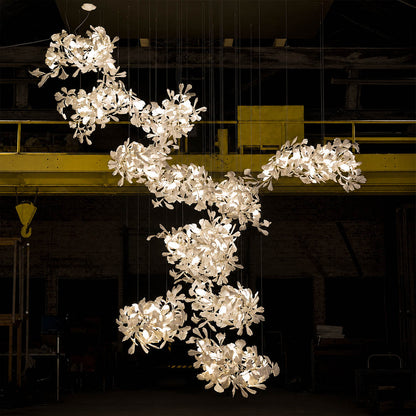 Gingko Chandelier Style M Model E flagship oversized boutique hotel lobby architectural statement mid century modern botanical commercial atrium warm ambient lifestyle interior