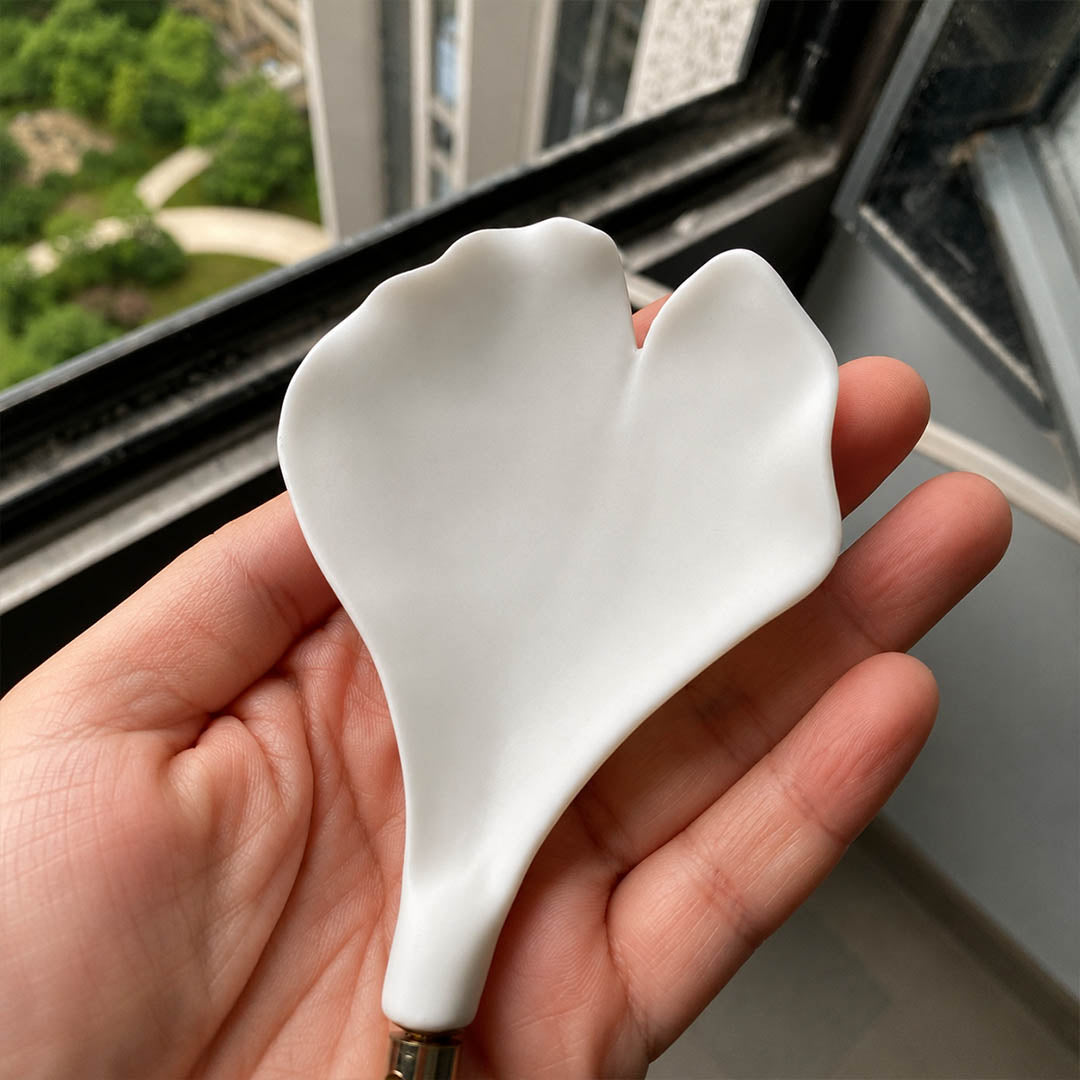 Gingko Chandelier Style M single ceramic hand-glazed porcelain ginkgo leaf matte white botanical detail close up craftsmanship