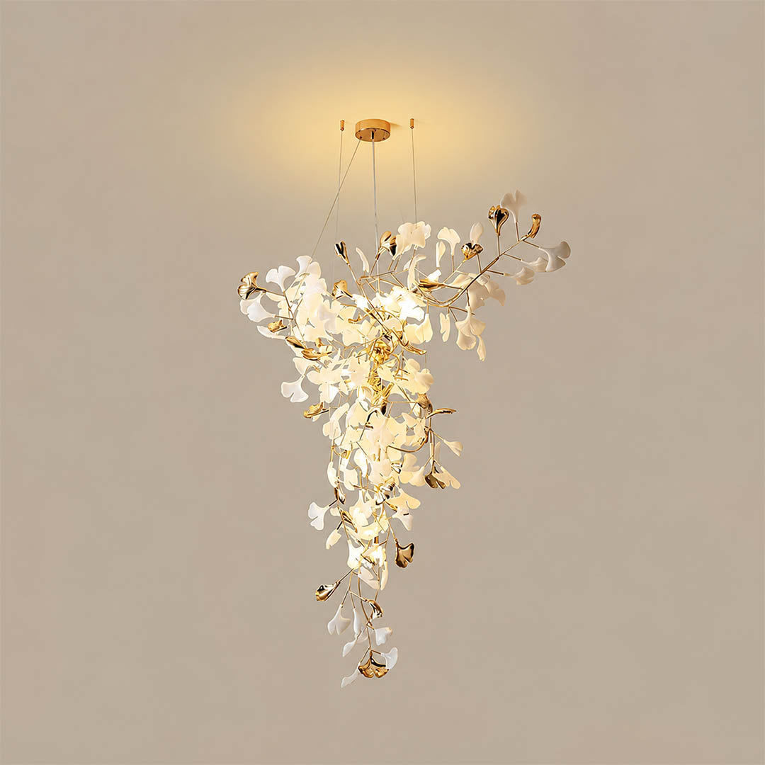 Gingko Chandelier Style M illuminated warm G9 evening ambient glow ceramic leaves soft light atmospheric detail close up mid century