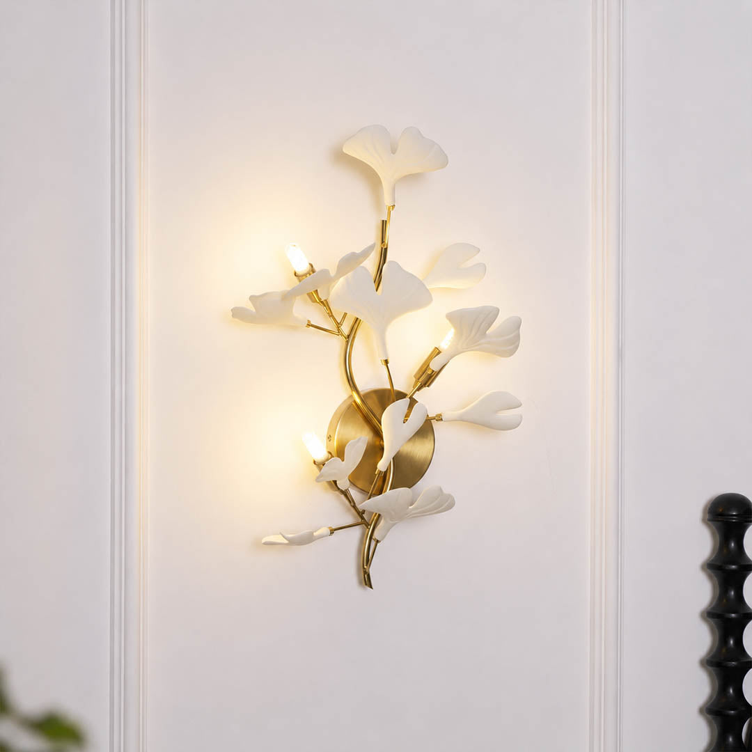 Gingko Sonia wall lamp above sofa living room mid century modern seating group warm ambient sculptural botanical lifestyle interior