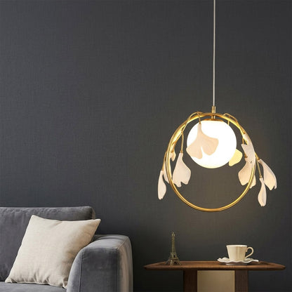 Ginkgo botanical pendant centered above master bed Japandi bedroom soft filtered glow neutral natural interior