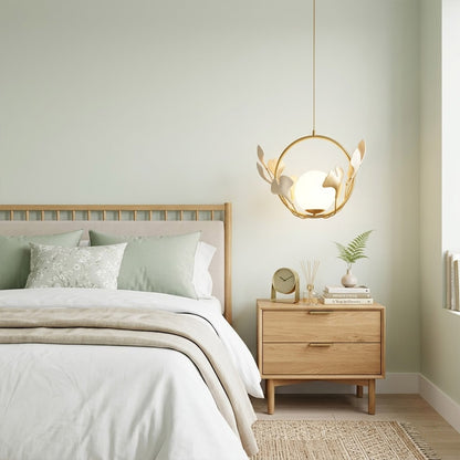Ginkgo botanical pendant centered above master bed Japandi bedroom soft filtered glow neutral natural interior
