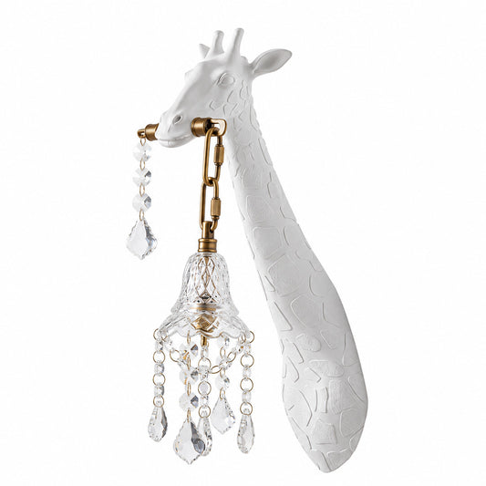Giraffe crystal wall sconce with a white resin giraffe head holding a sparkling crystal lantern on a wall