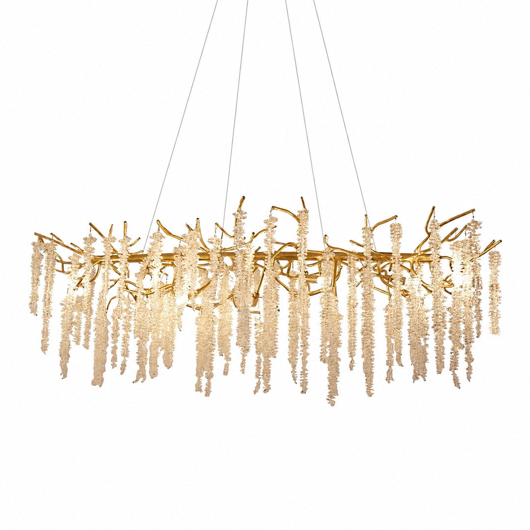 Glicine wisteria crystal chandelier with cascading clear crystal glass drops on a gold frame over a dining table
