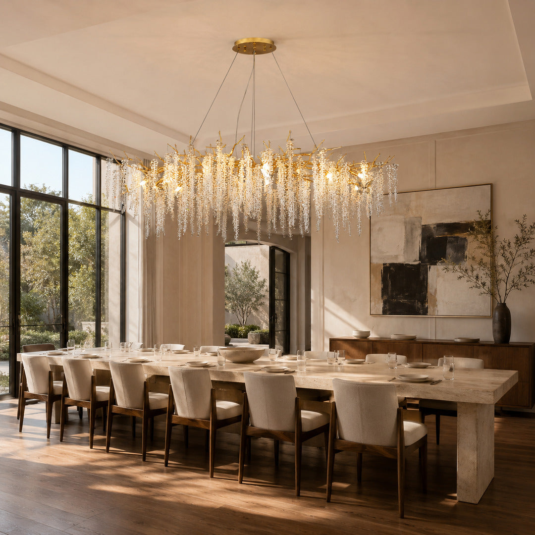 Glicine linear crystal chandelier sparkling over a rectangular dining table
