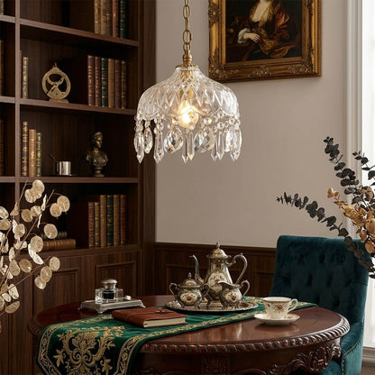 Goldie mid century modern dining room brass pendant clear glass warm interior
