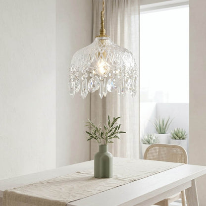 Goldie mid century modern dining room brass pendant clear glass warm interior