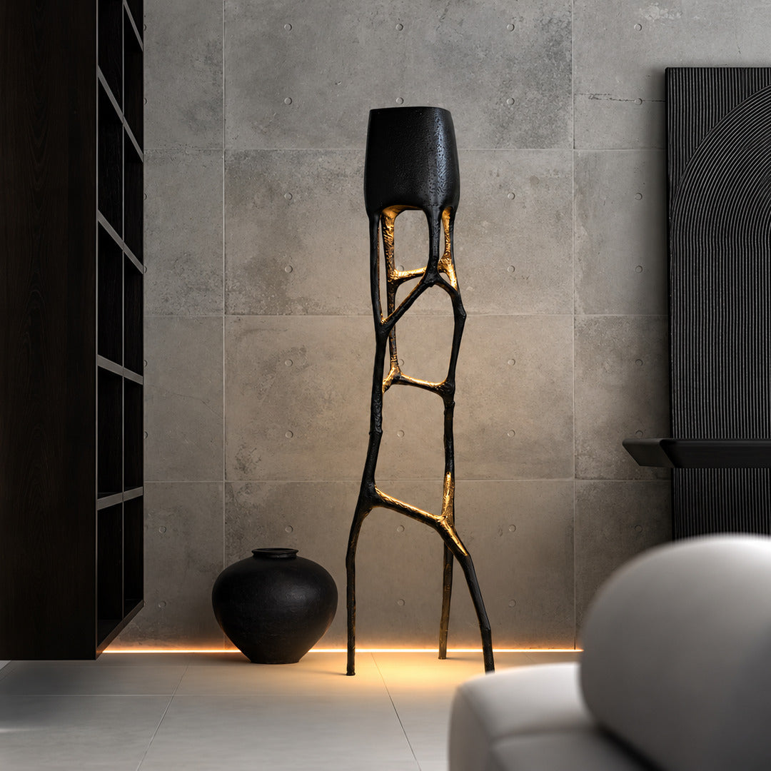 Gotica sculpture floor lamp as a dramatic artistic focal point in a boutique hotel lobby