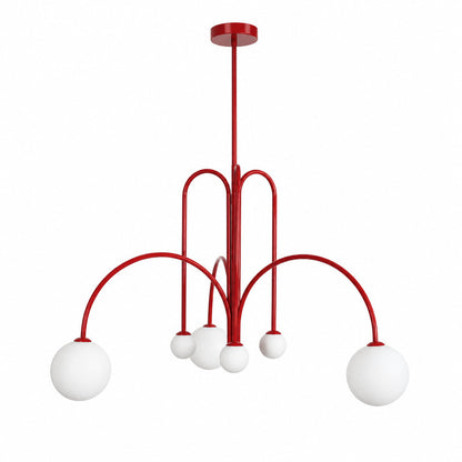 Gran Finale glass chandelier with a cluster of white glass globes glowing warm over a dining table