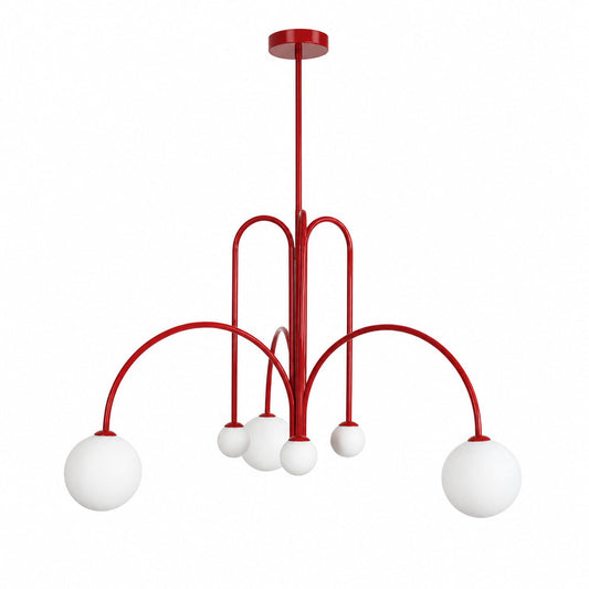 Gran Finale glass chandelier with a cluster of white glass globes glowing warm over a dining table