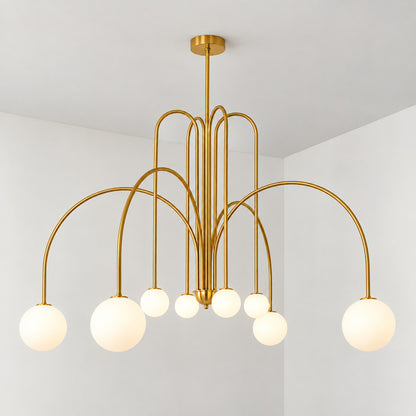 Eight-head copper Gran Finale glass chandelier as a warm luxe cluster over a table
