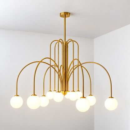 Twelve-head copper Gran Finale glass chandelier filling a grand entryway with a warm cluster