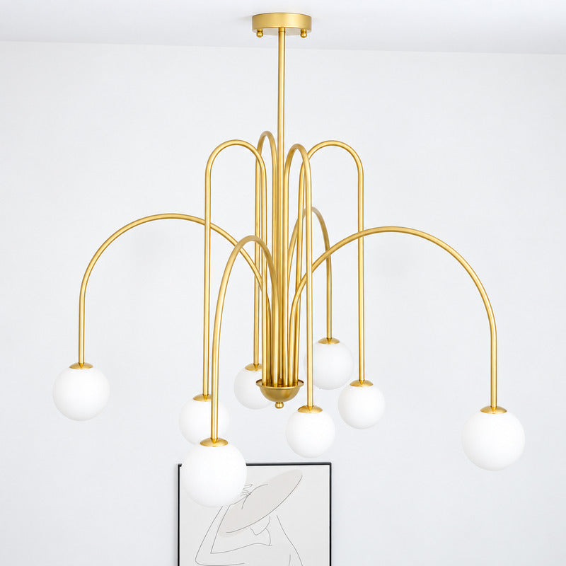 Detail of the white glass globe shades diffusing a soft warm glow on the Gran Finale chandelier