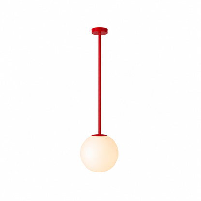 Single-head bright red Gran Finale glass pendant as a bold accent over a counter