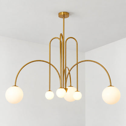 Six-head copper Gran Finale glass chandelier casting a warm glow over a dining table