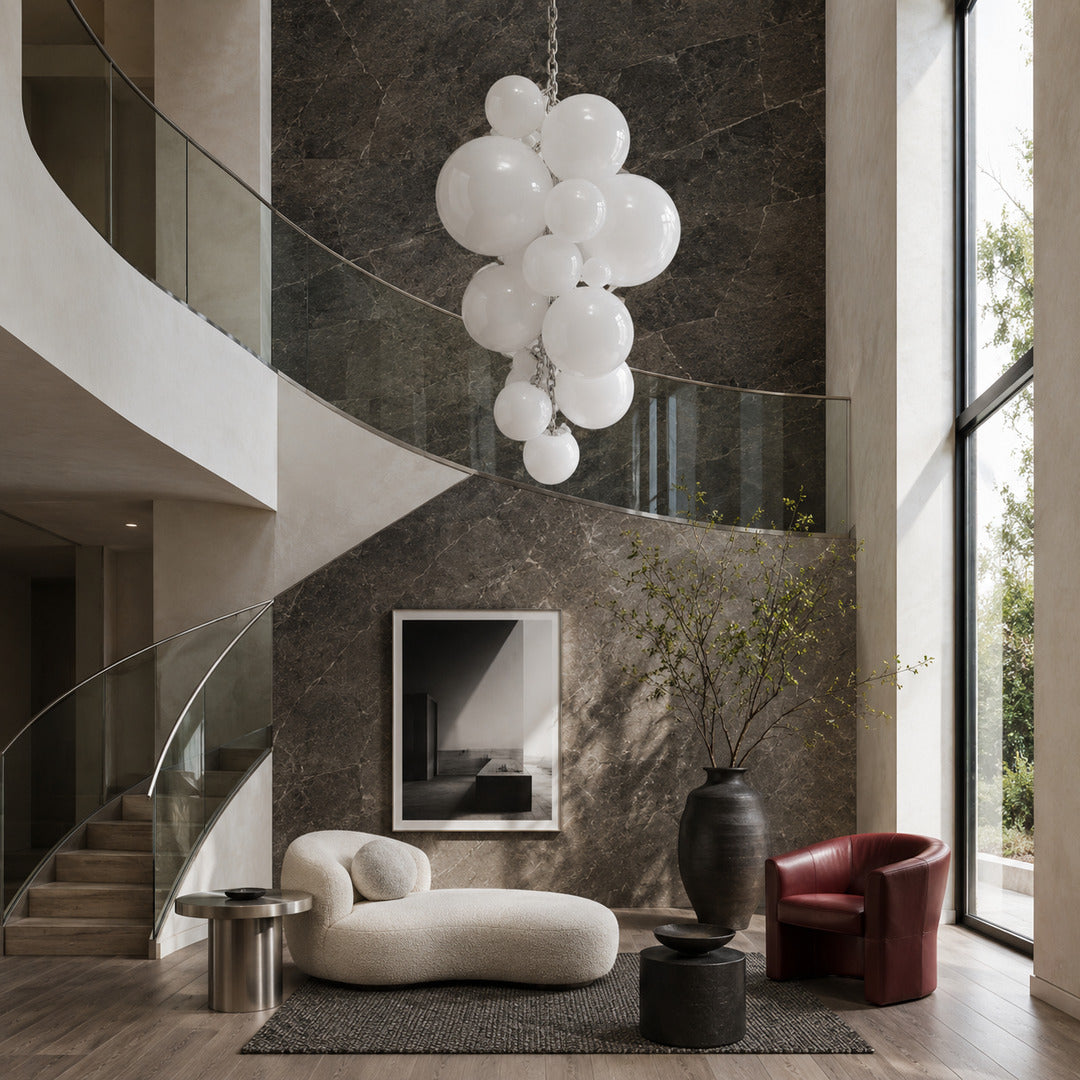 Grappolo glass chandelier as a colorful sculptural centerpiece in a modern living room