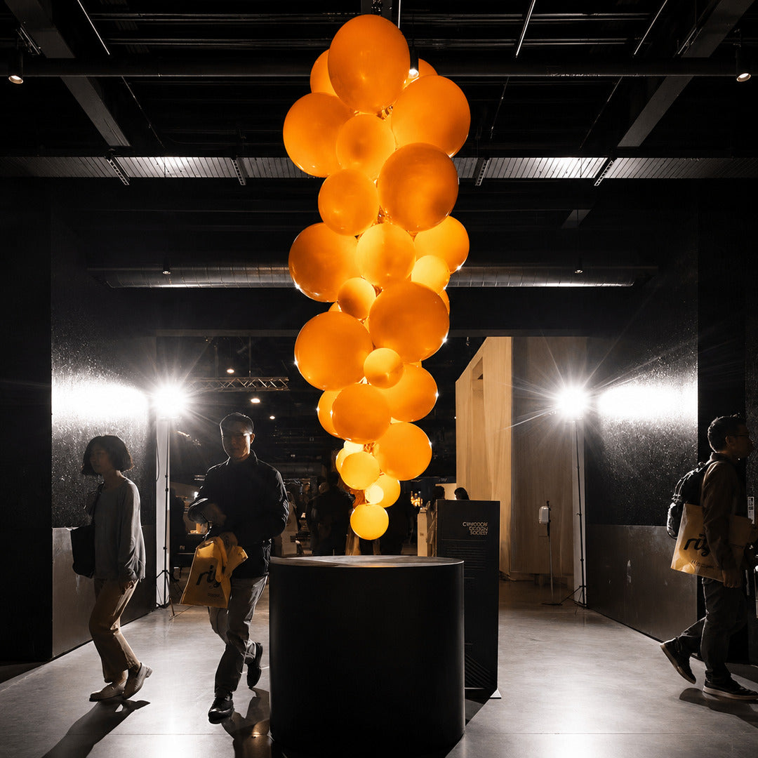 Large Grappolo glass chandelier creating a glamorous overhead centerpiece for an event venue