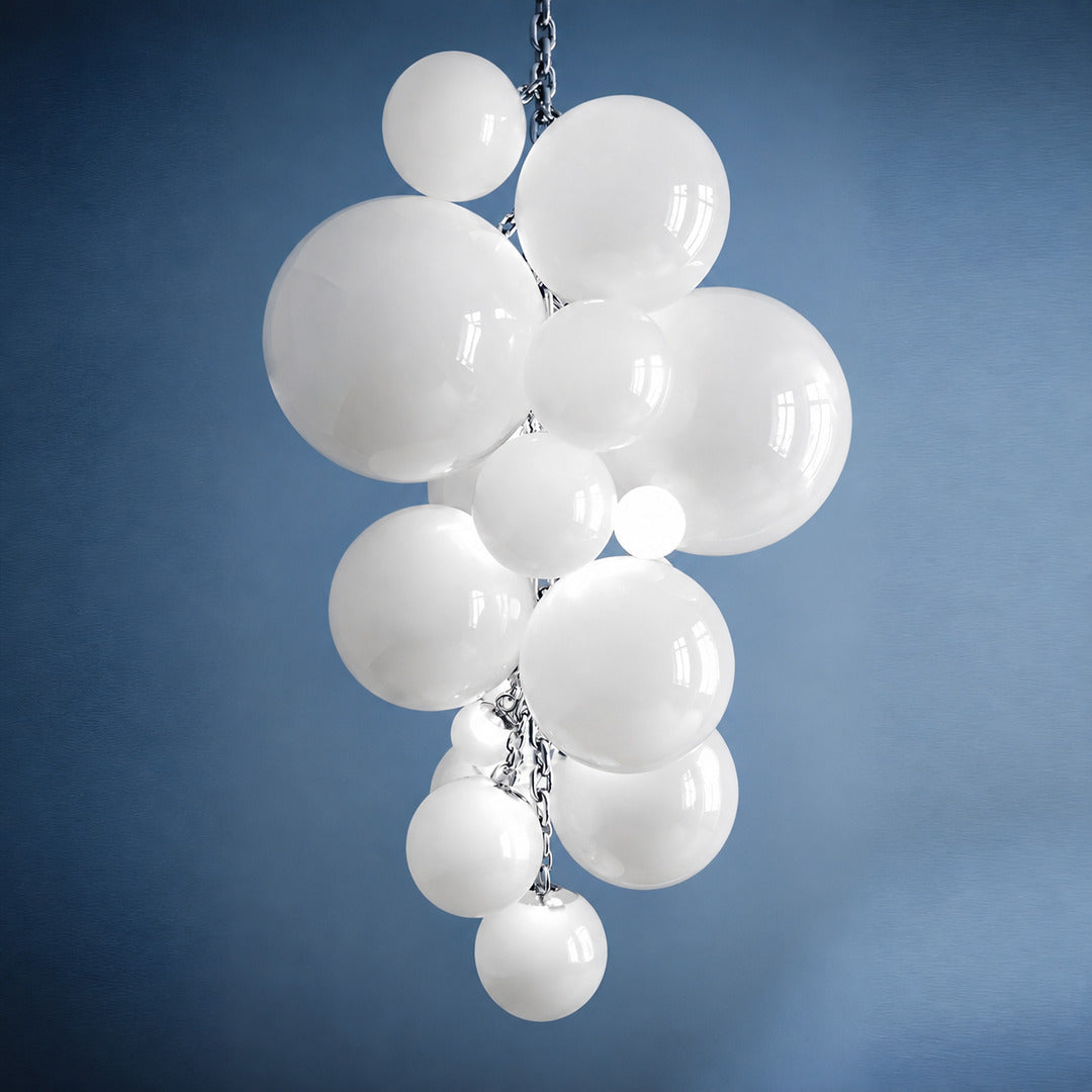 Small 39.4-inch white Grappolo glass chandelier over a dining table