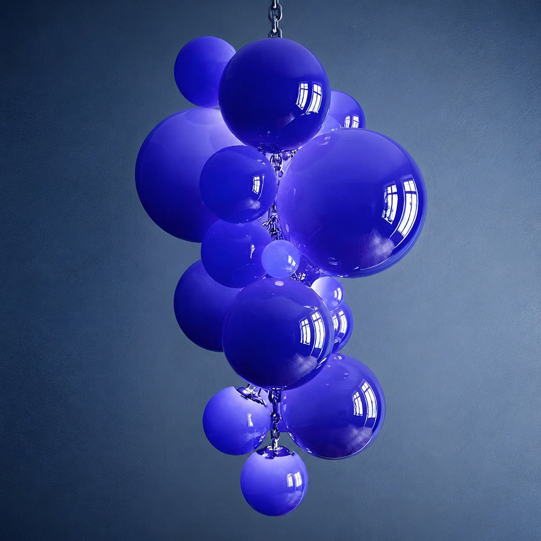 Small 39.4-inch blue Grappolo glass chandelier as a cool colorful statement over a table