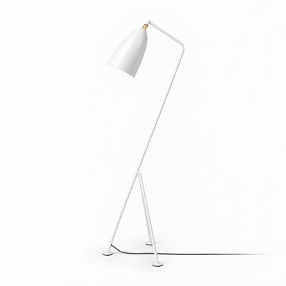 White Grillo angled metal floor lamp as a sleek accent in a bright modern room