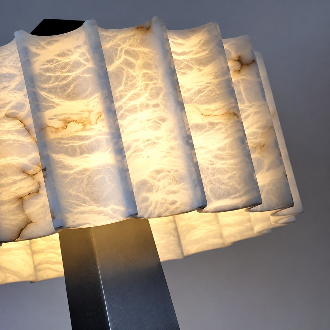 Close-up of natural veining glowing through the alabaster shade of the Guglia floor lamp