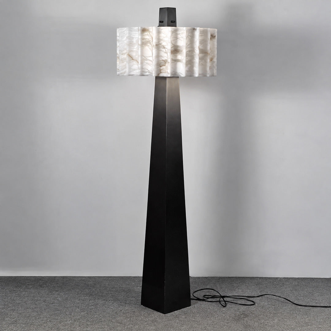Guglia alabaster floor lamp with black obelisk column and round white alabaster shade on a white background