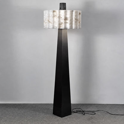 Guglia alabaster floor lamp with black obelisk column and round white alabaster shade on a white background