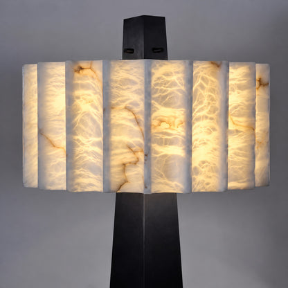 Close-up of natural veining glowing through the alabaster shade of the Guglia floor lamp