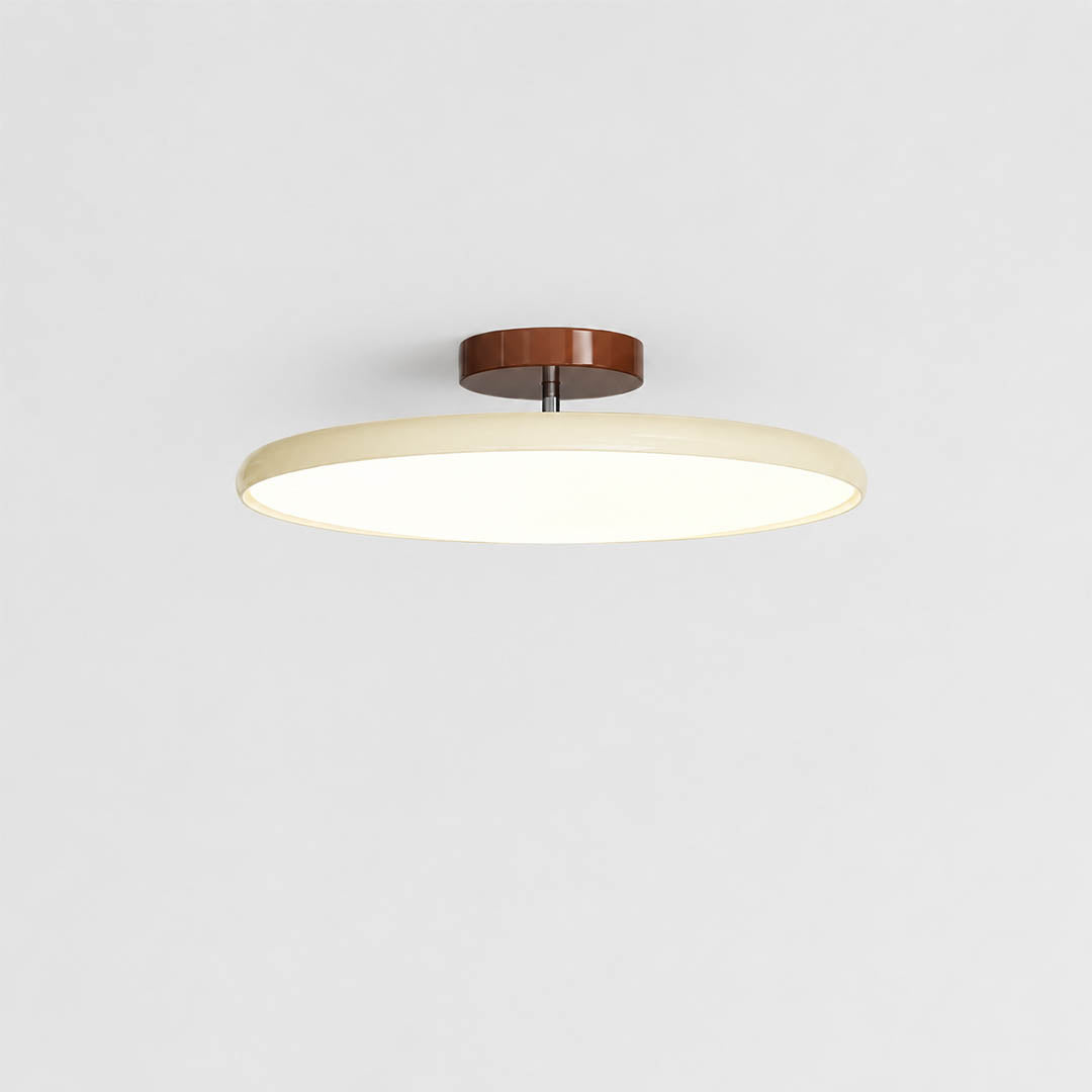 Halden swivel slim LED flush mount ceiling light Cream warm ivory shade terracotta canopy modern minimalist Scandinavian white background