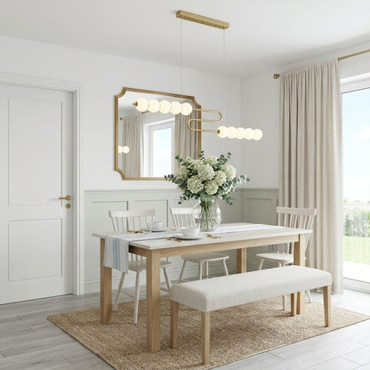 Halia pearl ring chandelier above round dining table elegant warm glow modern interior