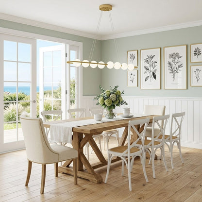 Halia pearl ring chandelier above round dining table elegant warm glow modern interior