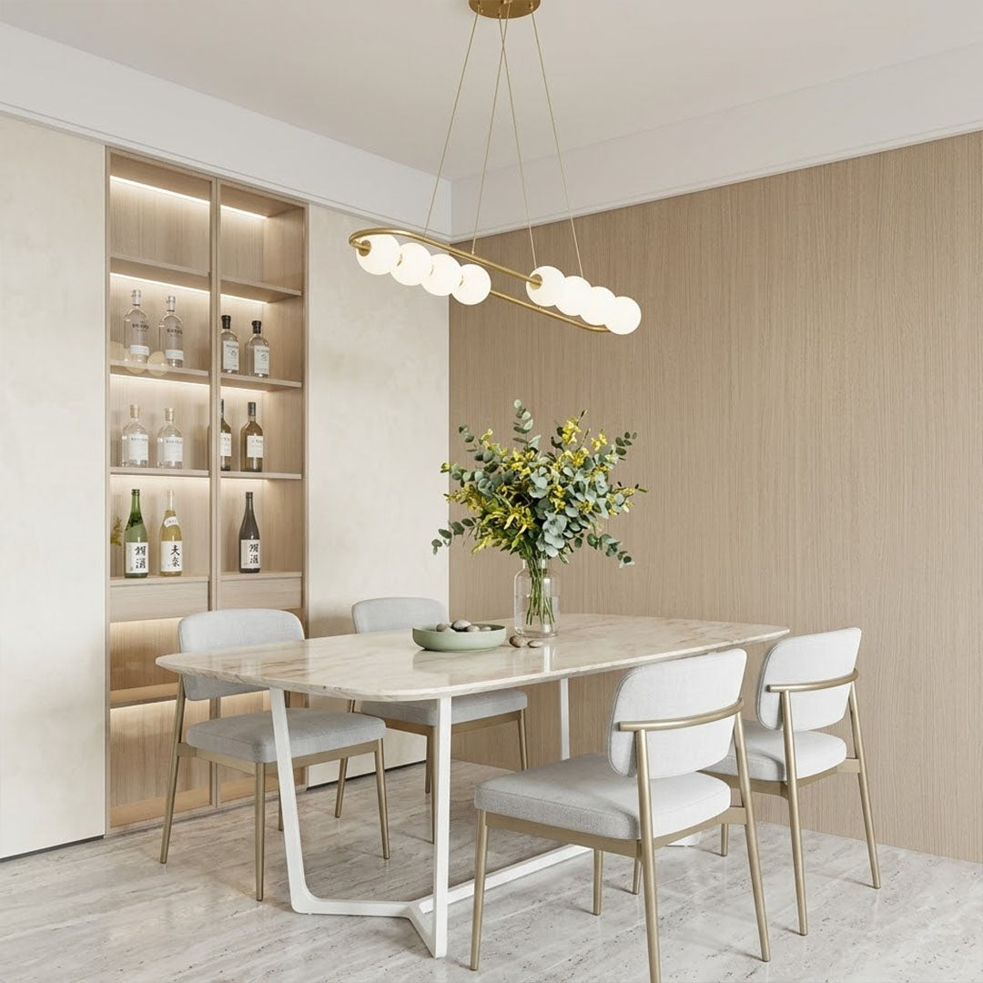 Halia pearl ring chandelier above round dining table elegant warm glow modern interior