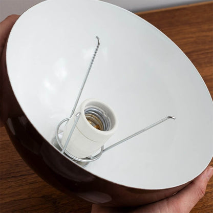 Halo pendant light two facing half sphere metal dome shape detail close up