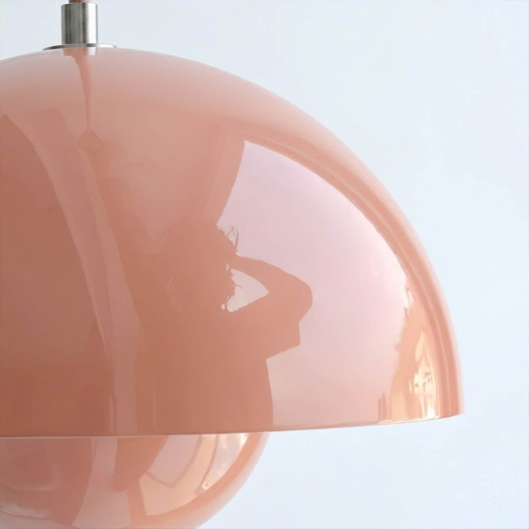Halo pendant light two facing half sphere metal dome shape detail close up