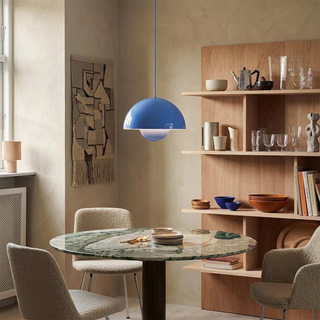 Halo pendant lights three in a row above kitchen island mid century modern interior