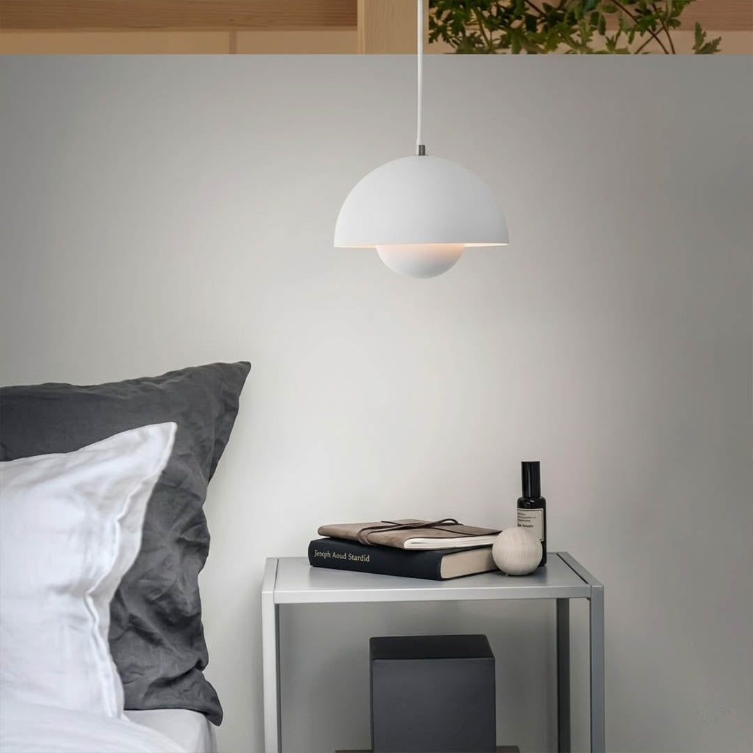 Halo pendant lights three in a row above kitchen island mid century modern interior