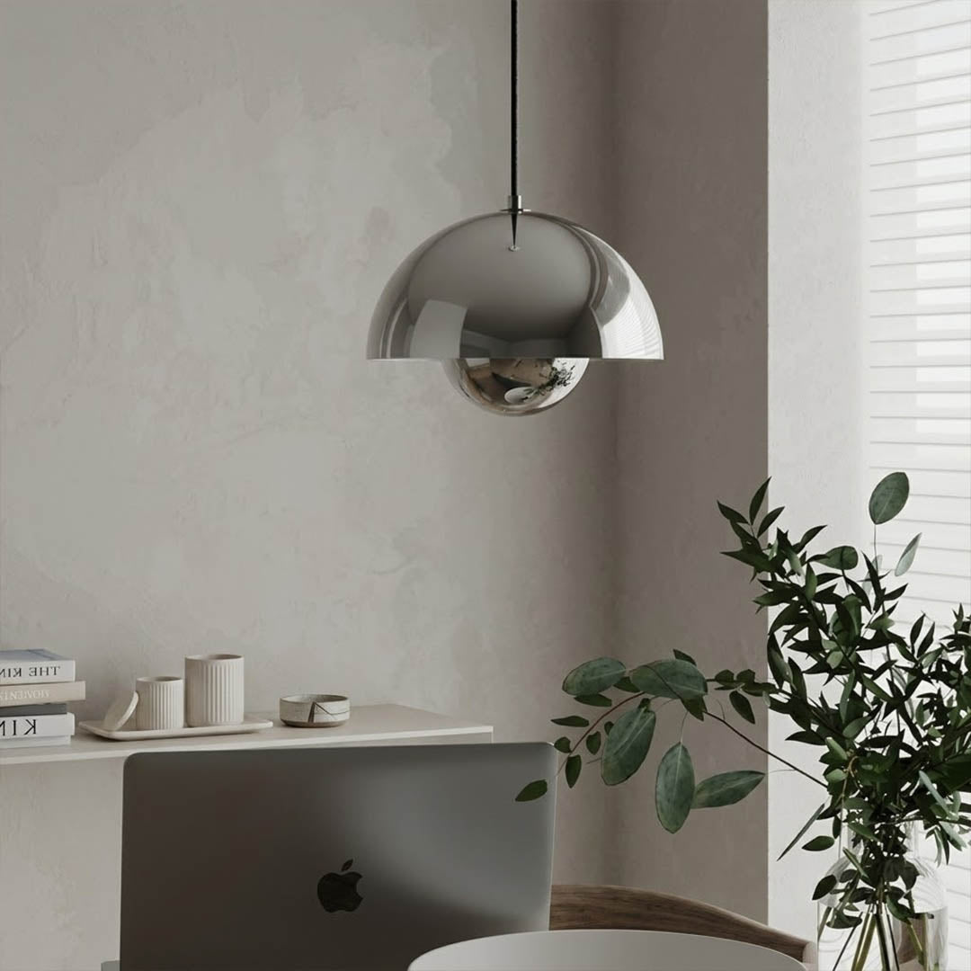 Halo pendant lights three in a row above kitchen island mid century modern interior