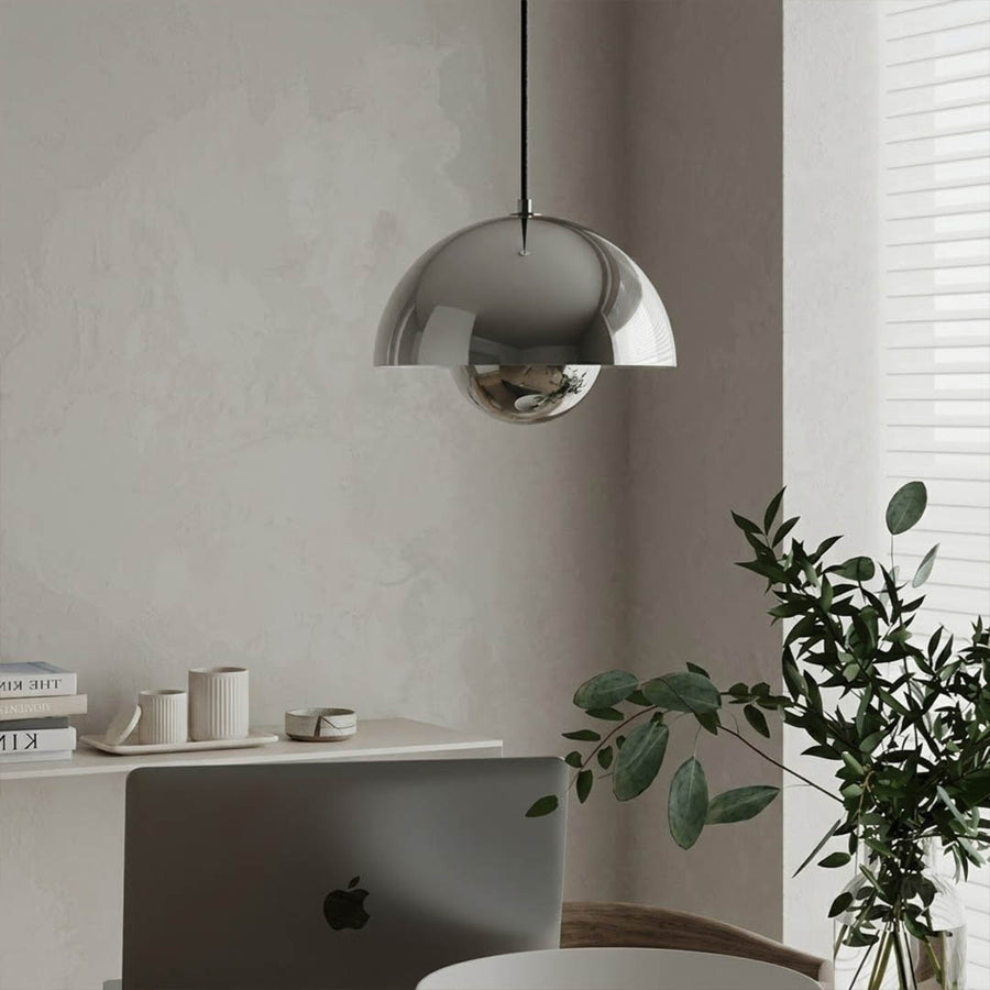 Halo pendant lights three in a row above kitchen island mid century modern interior