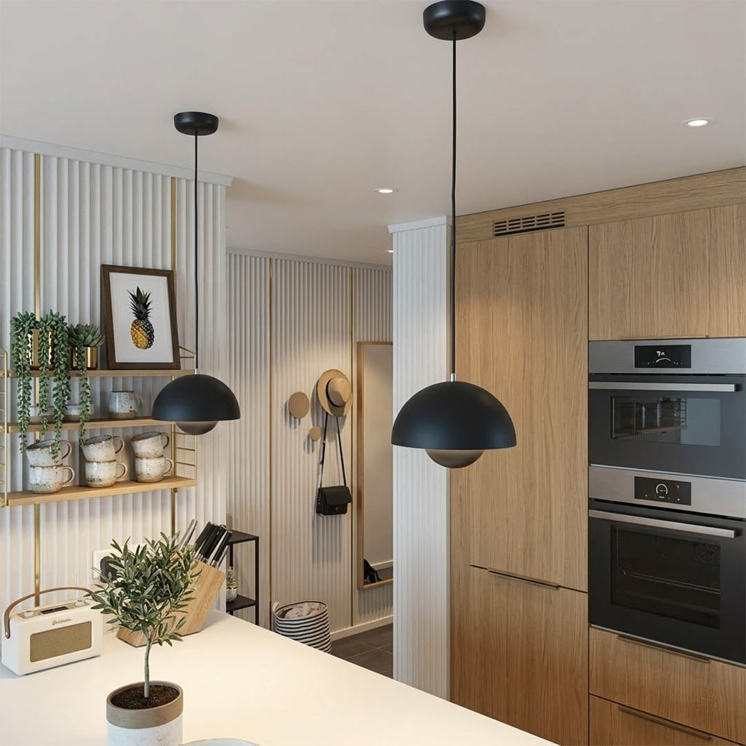 Halo pendant lights three in a row above kitchen island mid century modern interior