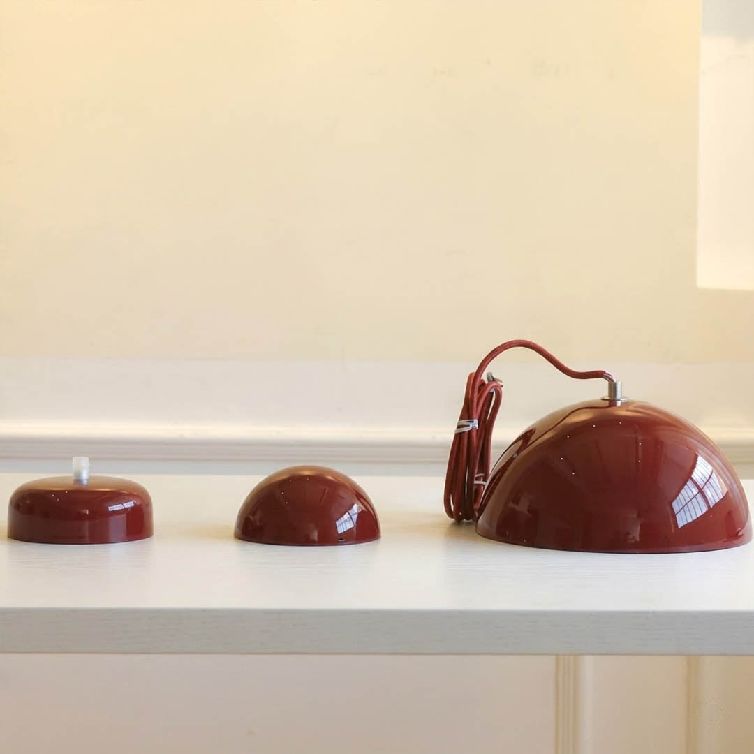 Halo pendant light two facing half sphere metal dome shape detail close up